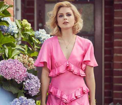 Rose McIver poses for a picture in garden of her house.